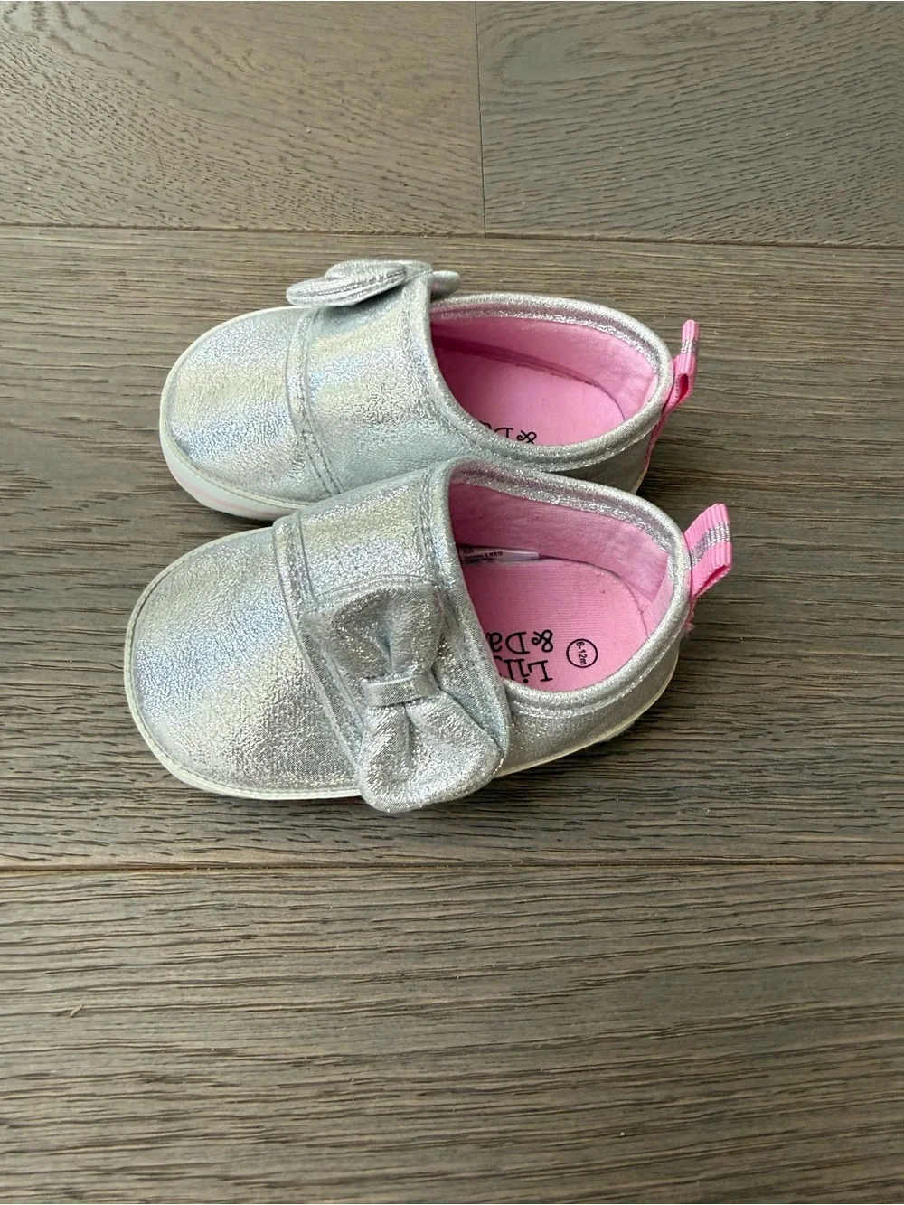 Lily & Dan Baby Silver Bow Slip-On Shoes with Pink Lining